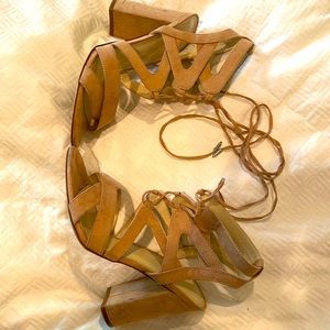 David’s bridal wedding shoes; tie around ankle. Worn once but went hard :)